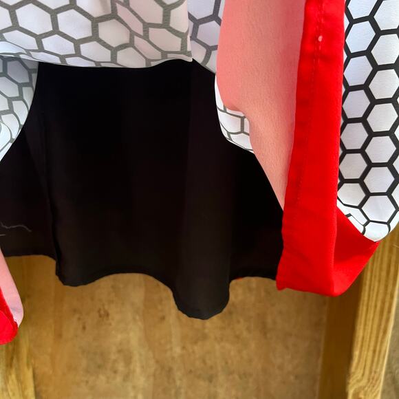 Elegant Black and White Polka Dot Dress with Red Accents - Picture 5 of 9